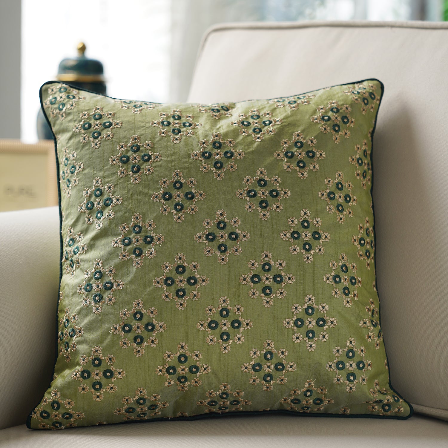 Green embroidered outlet cushion