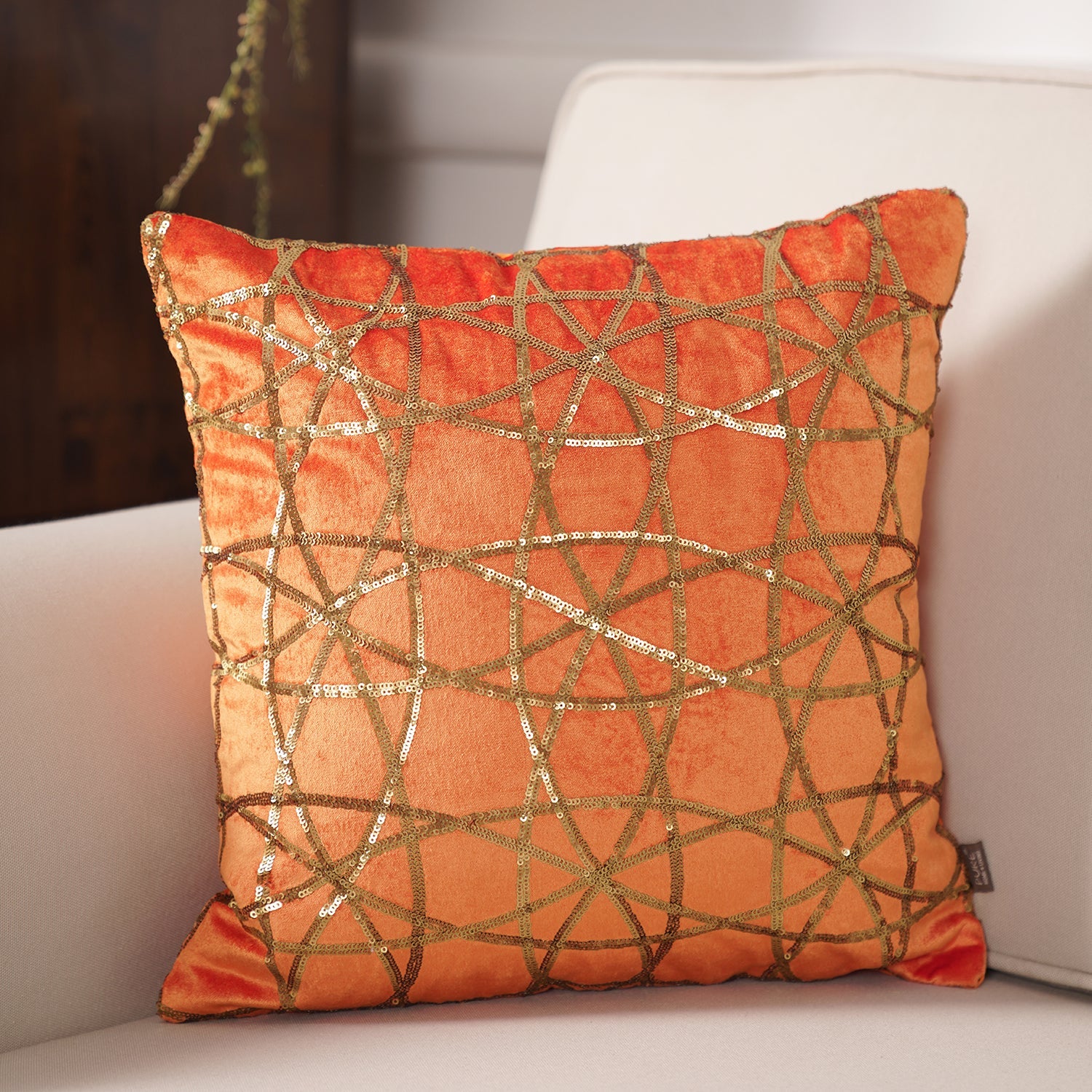 Orange store sequin pillow